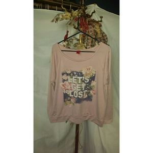 Faded pink graphic shirt.